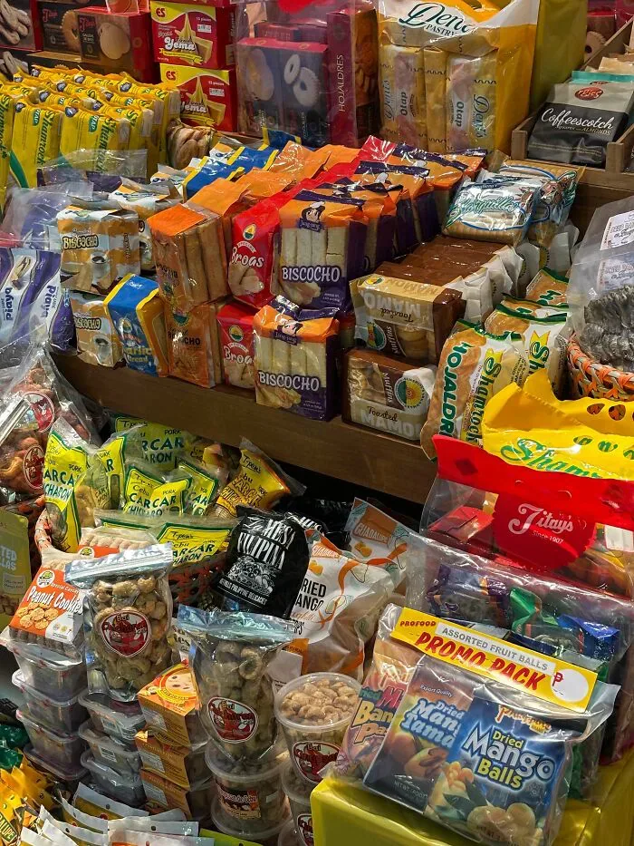 A stall brimming with various packaged snacks, representing common misunderstandings between locals and foreigners.